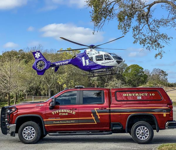 District 10 Command Vehicle and First Flight helicopter