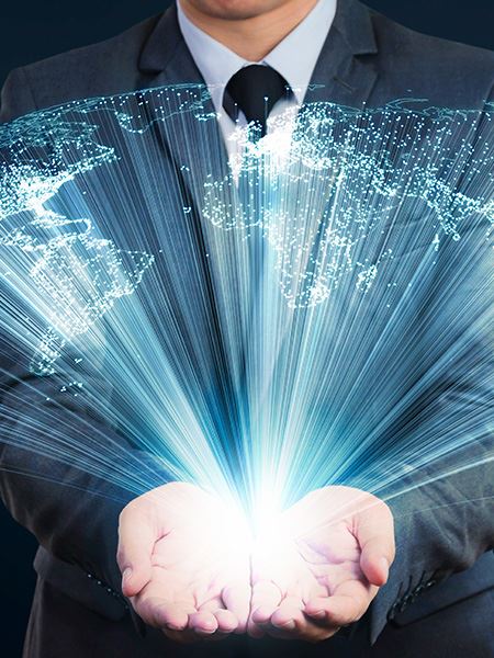 hands holding hologram of world continents