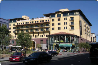Yellow Building on a Busy Street