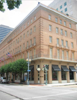 Corner of a Building with a Light Post